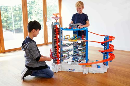 Hot Wheels Toy Track Set & 4 1:64 Scale Cars, 3+ ft Tall With Motorized Gorilla & Storage for 140 Cars + 40-ft Track Pack & Set of 20 Toy Vehicles in 1:64 Scale