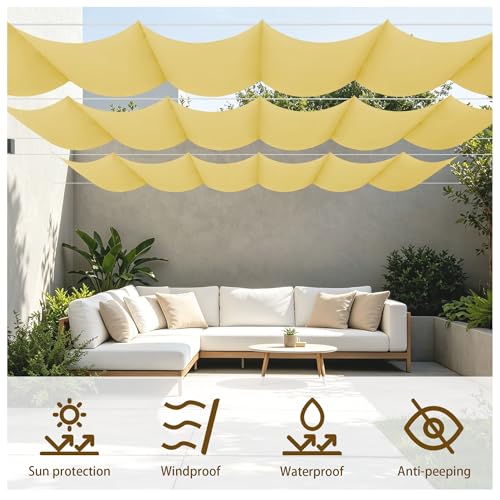 Toile d'ombrage rétractable jaune sable pour aménager un patio et grand balcon