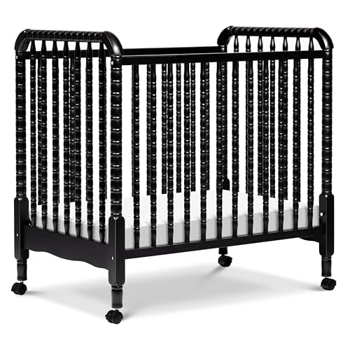 Image of Davinci Jenny Lind 3-in-1 Convertible Mini Crib in Ebony, Removable Wheels, Greenguard Gold Certified