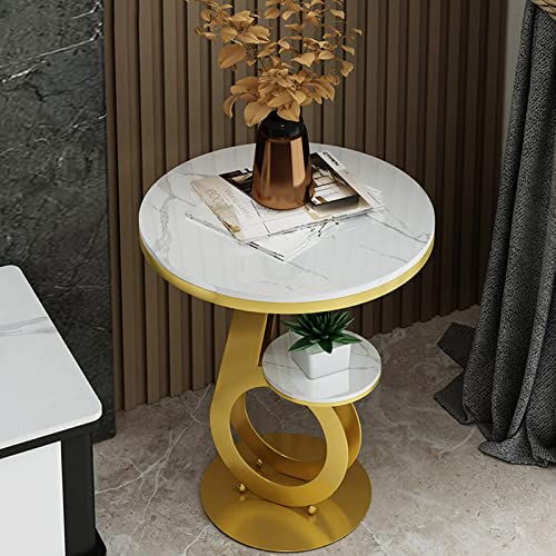 Table basse ronde dorée en métal au design moderne de salon