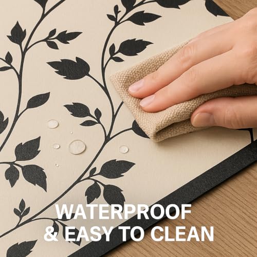 Image of YELONA Leather Dining Table Placemats Set of 2 - Waterproof, Heat Resistant, Anti-Slip, Easy to Clean Table Mats for Dining Table, Kitchen & Home Decor (Black Botanical, 40 x 30 cm)