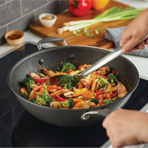 Image of Circulon A1 Series Nonstick Induction Stir Fry Pan, 13.25-Inch, Graphite | Non stick frying pan for fast, even heat, with ScratchDefense Technology, dishwasher safe cooking pan, oven safe to 400AF