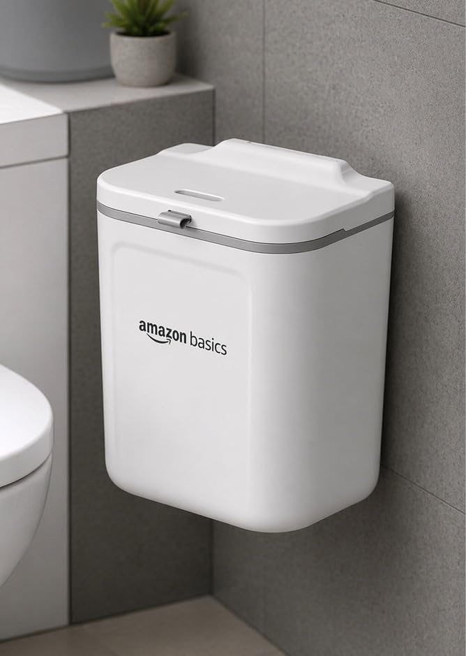 amazon basics Plastic Wall Mounted Hanging Dustbin With Lid For B...