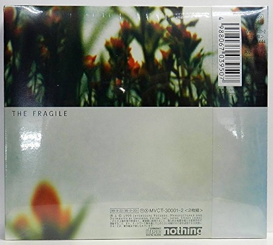 Amazon.co.jp: ザ・フラジャイル - ナイン・インチ・ネイルズ