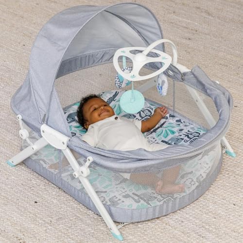 Image of Infantino Sweet Dreams Fold & Go Bedside Bassinet, Lightweight Portable Baby Sleeping Bed, Quick Fold and Easy to Carry, Adjustable Canopy, Indoor and Outdoor Crib for Bebies