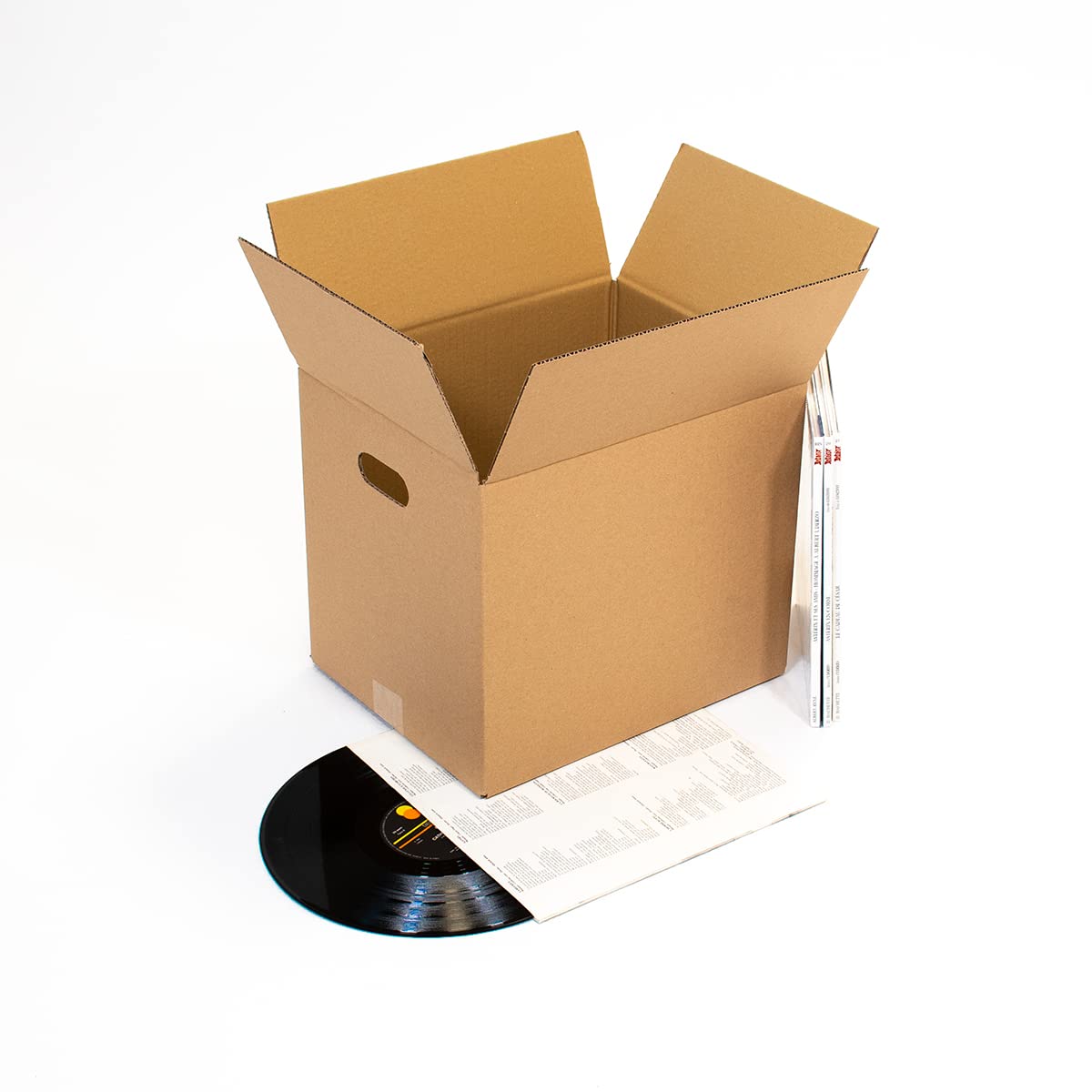 Lot de 30 cartons BD, vinyles DC + 1 Adhésif