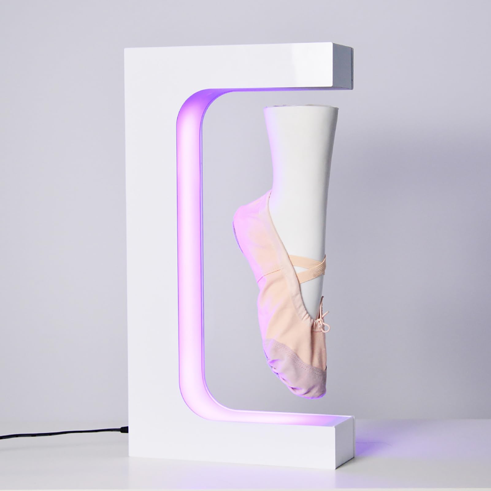 Magnetic levitation Foot Mold Display Stand is a Novel and Creative Rotating Sock Display Stand, Suitable for Window Shopping mall Store Display.