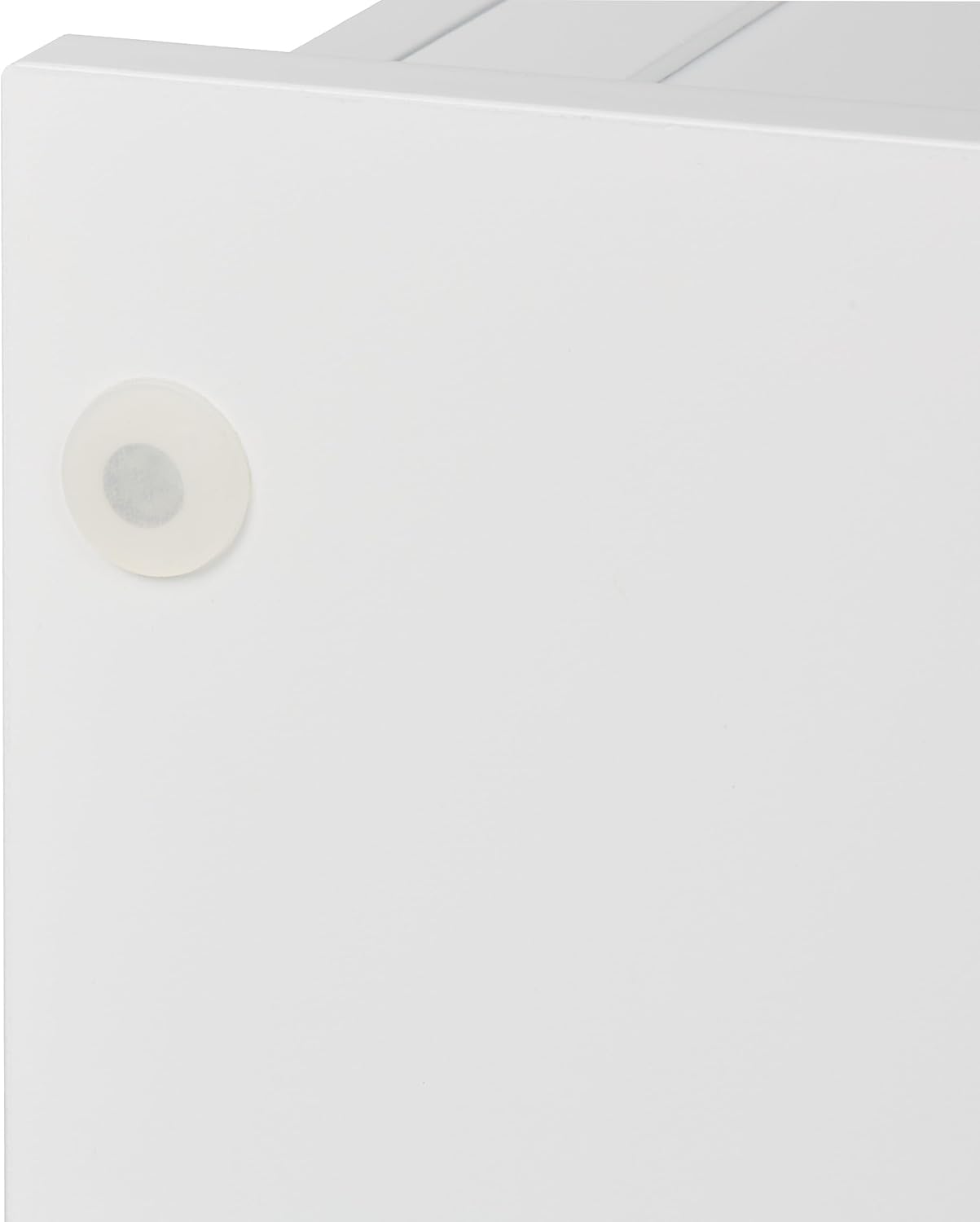 Close-up of the magnetic door closure mechanism