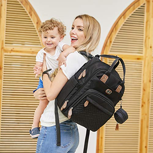 Dikaslon Wickeltasche Rucksack – Großer Wickelrucksack mit viel Stauraum, Wickeltasche groß mit Schnullerhalter, Wickelauflage & Kinderwagengurten – für Mama & Papa (Schwarz, Einheitsgröße)