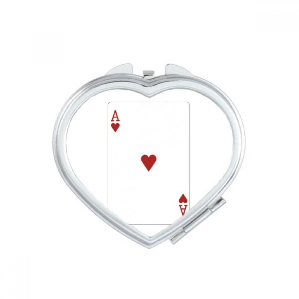 Miroir de poche à la main motif cartes à jouer pour retouches maquillage au bureau