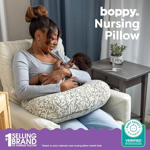 Image of Boppy Nursing Pillow - Ergonomic Bottle & Breastfeeding Pillow, Higher, Firmer & Larger, Water-Repellent with Washable Organic Cotton Cover, Baby Safety Alliance Verified - Green Cut Out Leaves
