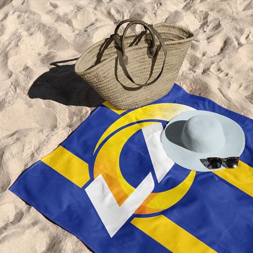 Image of Northwest NFL Los Angeles Rams Unisex-Adult Beach Towel, 30 inch x 60 inch, Zone Read