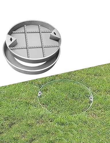 Couvercle de regard pour gazon qui dissimule la fosse septique dans le jardin