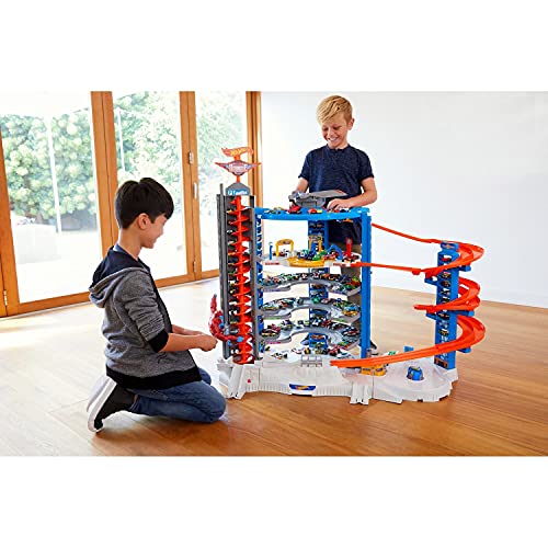 Hot Wheels Track Set With 4 1:64 Scale Toy Cars, Over 3-Feet Tall Garage With Motorized Gorilla, Storage For 140 Cars, Super Ultimate Garage ​​​​ #TOP4