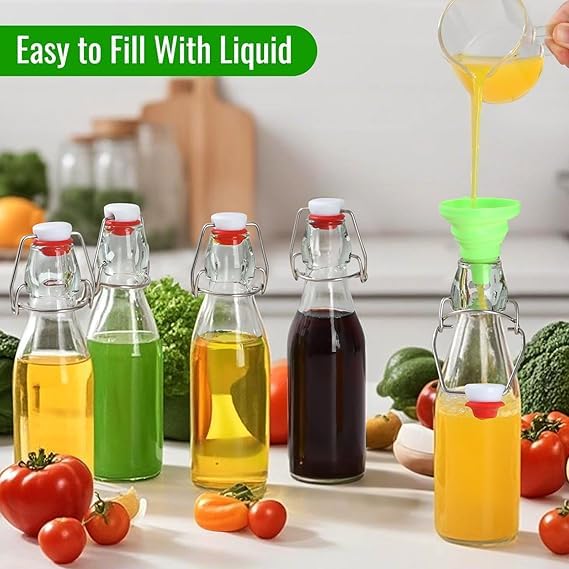 Image of Clear Glass Bottles with Airtight Swing Top Lids - Leakproof Reusable Round Glass Jars for Water, Juice, Kombucha, Milk, Vinegar, Oil & Beverages - Pack of 4 (Clear)