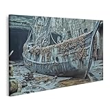 islandburner Prime Bild auf Leinwand Altes Schiff mit Muscheln an verlassener Hafenanlage Bilder Wandbilder Poster