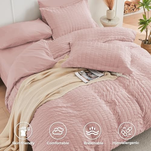 Image of HYMOKEGE Rose Gold King Size Comforter Set Seersucker 7 Pieces, All Season Luxury Bed in a Bag for Bedroom, Bedding Set with Comforters, Sheets, Pillowcases & Shams