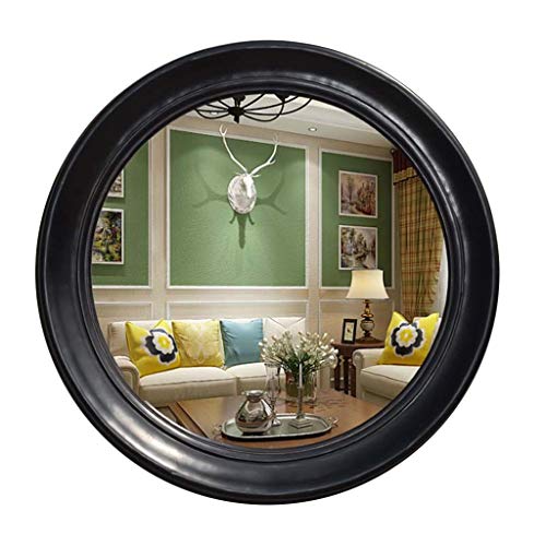 Miroir de salle de bain rond et moderne pour illuminer votre porche