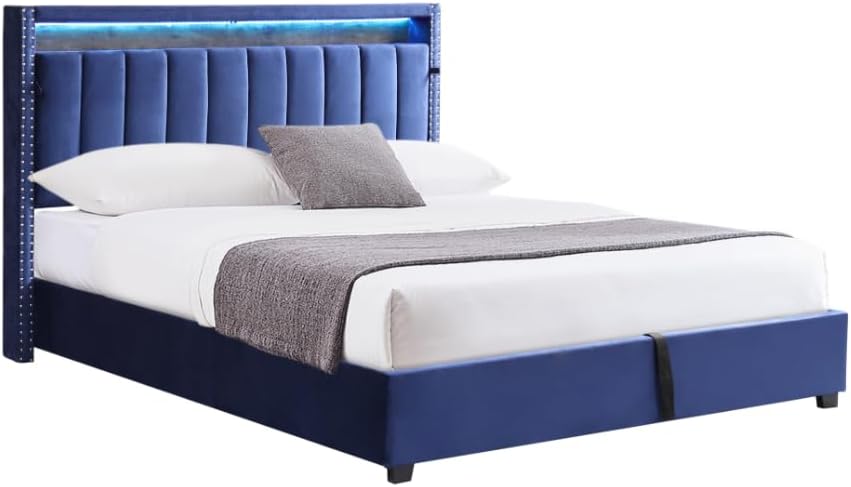Bed frame without mattress, showing the slat system and headboard with integrated shelf.