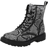 Modischer Auftritt: Der Snake-Print in Schwarz und Weiß zieht alle Blicke auf sich und lässt sich vielseitig zu modernen Streetstyle-Looks kombinieren.