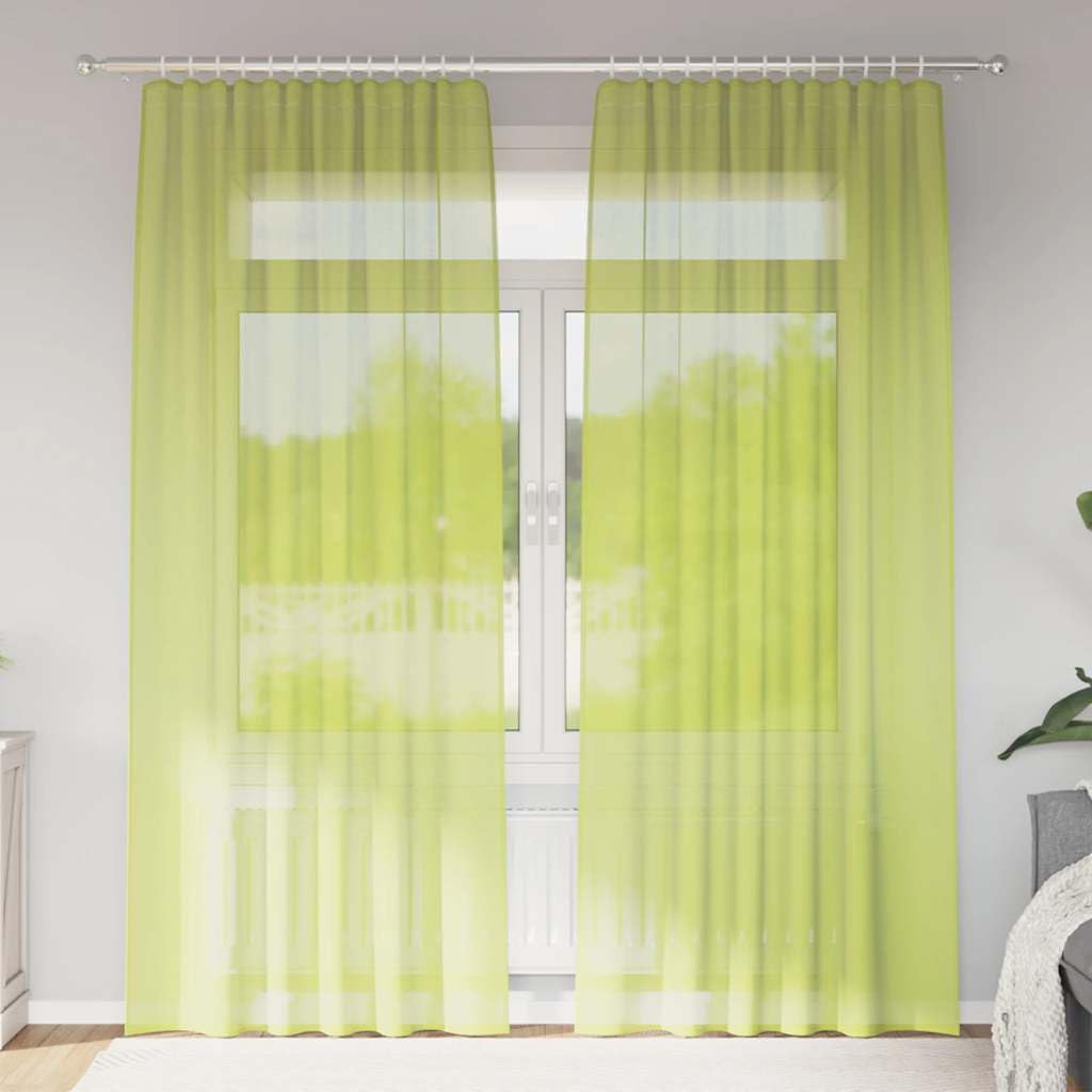 Rideaux voiles vert pomme anti vis-à-vis pour retrouver l'intimité du salon