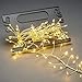 Produktbild Konstsmide Micro LED Büschellichterkette Cluster, mit Aufroller, 400 bernsteinfarbene Dioden, 12V Außentrafo, silberfarbener Draht - 6471-890