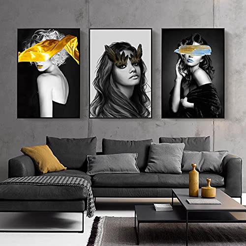 Tableau contemporain salon chic avec motif abstrait femme noir et or