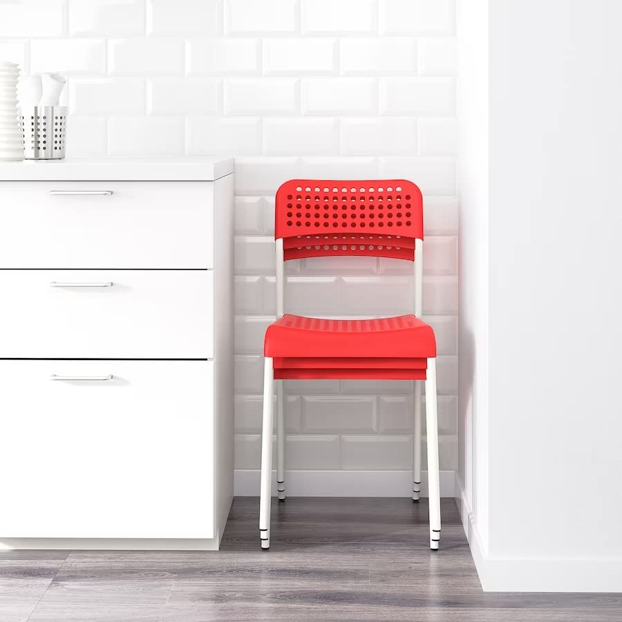 Ikea Light, airy and Stackable adde Chair(red). 2