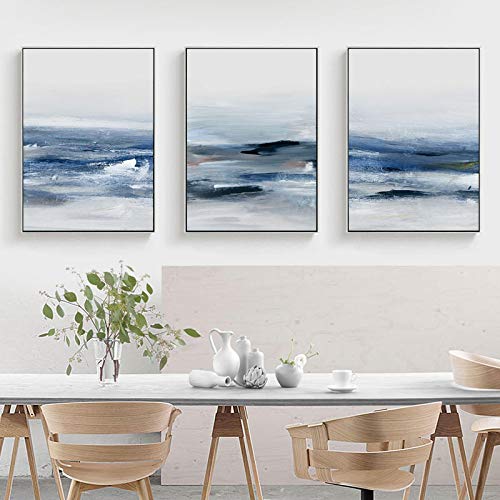 Chambre à coucher apaisante avec cette toile bleu mer abstraite