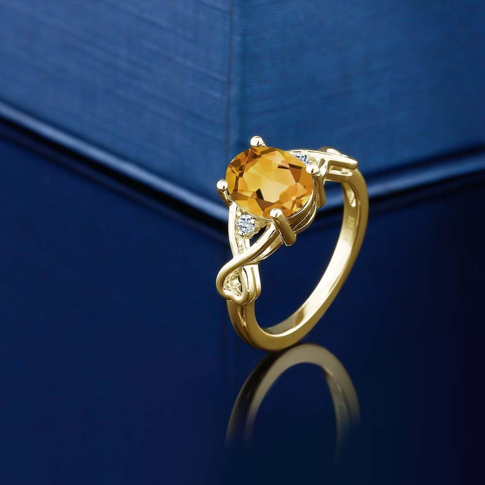Gem Stone King 3-Stone Wedding Anniversary Promise Ring for Women | 18K Yellow Gold Plated Silver | Gemstone Birthstone and White Topaz | Oval 9X7MM | Round 1.8MM Accents | Available In Size 5-9