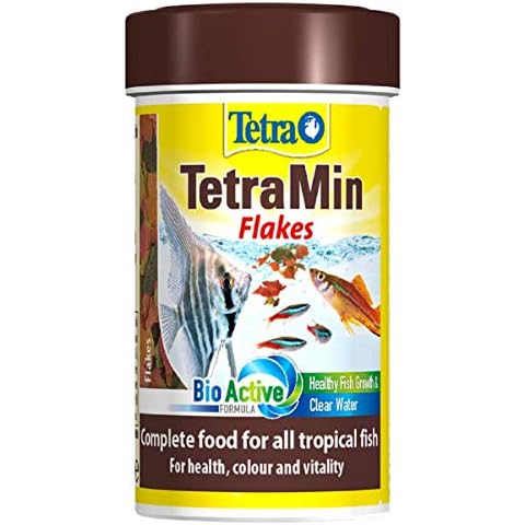 Tetra Min Fish Food Flakes, Complete and Varied Food for All Tropical Fish, 100 ml/20 g Cover