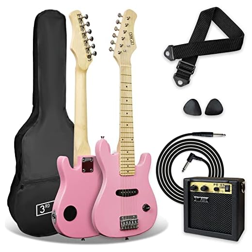 3rd Avenue Pack de guitarra eléctrica de tamaño 1/4 para niños principiantes de 3rd Avenue , amplificador portátil de 5 W, cable, funda de transporte, púas y correa, Rosa