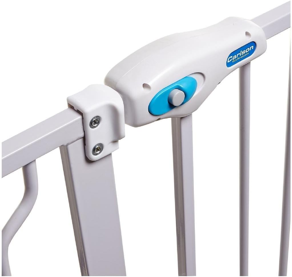 Close-up of the Carlson Pet Products gate latch mechanism, showing the blue release button.