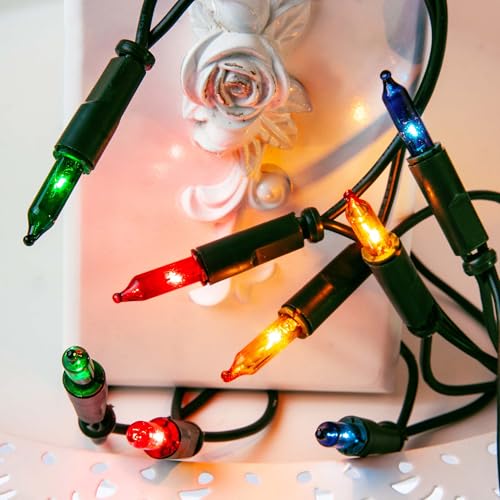 hellum Lichterkette innen mit 50 LED, mini Lichterkette bunte Lichter beleuchtete 7,35m, bunt strombetrieben mit grünem Kabel, <59 Lumen 835076 hellum Lichterkette innen mit 50 LED, mini Lichterkette bunte Lichter beleuchtete 7,35m, bunt strombetrieben mit grünem Kabel, <59 Lumen 835076