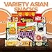 Dagaon Asian Snack Box 22 Count - Snacks from Korea, Japan, China, Indonesia, Taiwan, Vietnam, Etc. Assortment of Chip, Ramen, Biscuits, Cookies, Pies, Crackers, Candies and Much More.