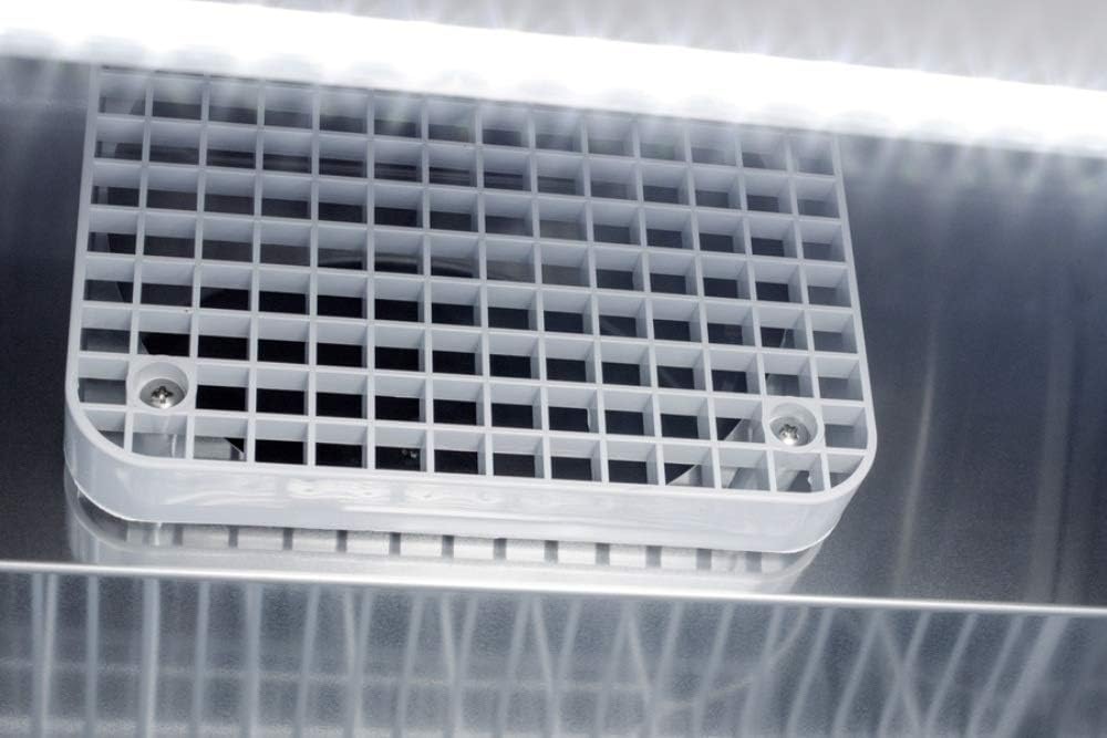 Close-up of the interior fan and ventilation grille inside the Summit Appliance ARS49ML refrigerator.