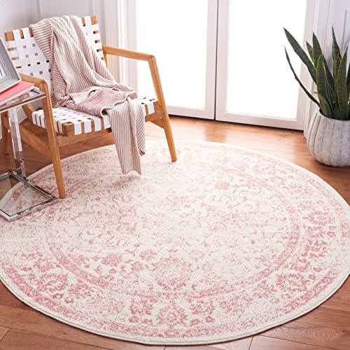 Image of SAFAVIEH Adirondack Collection Area Rug - 5' Round, Ivory & Rose, Distressed Vintage Floral Design, Non-Shedding & Easy to Clean, Ideal for Living Room, Bedroom, Dining Space (ADR109H)