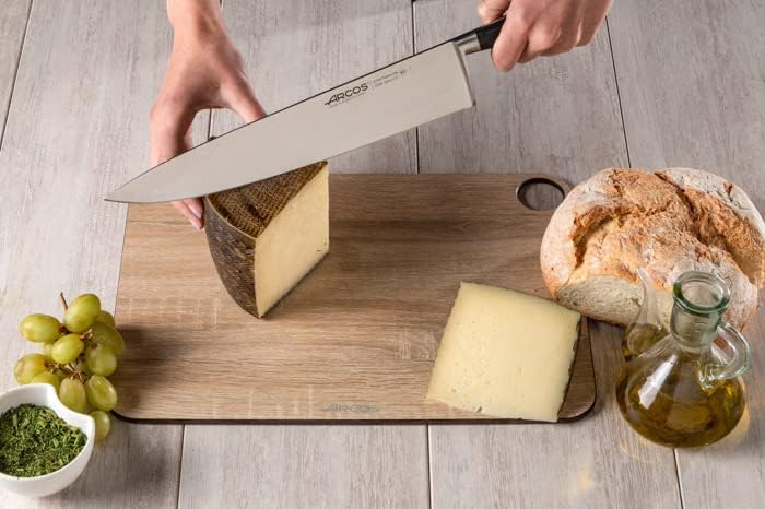 Miniatura 7 de Arcos Cuchillo de chef forjado de acero inoxidable de 12 pulgadas. Cuchillo de cocina profesional multiusos para cortar carne y verduras. Mango