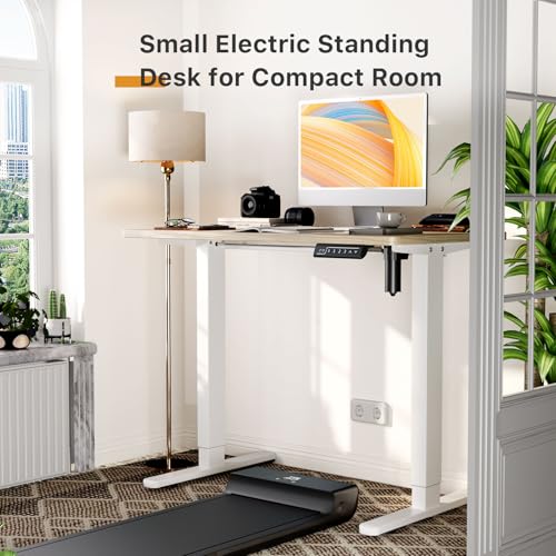 Image of JOY worker Small Electric Standing Desk, 35 inch x 20 inch Whole Piece Height Adjustable Desk with Memory Controller, Light Walnut Sit to Stand Workstation for Home Office