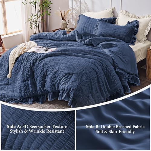 Image of JOLLYVOGUE Oversized King Comforter Set, 3 Pieces Navy Blue Seersucker Comforters, Lightweight & Fluffy Bedding Sets for All Season with 1 Ruffle Comforter and 2 Ruffle Pillowshams
