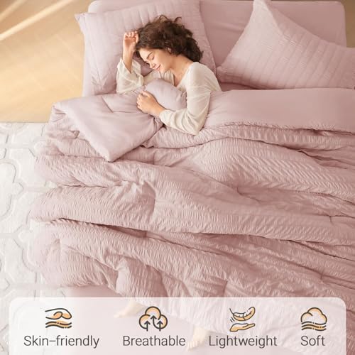 Image of MUXHOMO 7 Pieces King Comforter Set, Seersucker Bed in a Bag King Size, All Season Luxury Bedding Set with Comforter, Flat Sheet, Fitted Sheet, Pillowcases & Shams, Rose Gold