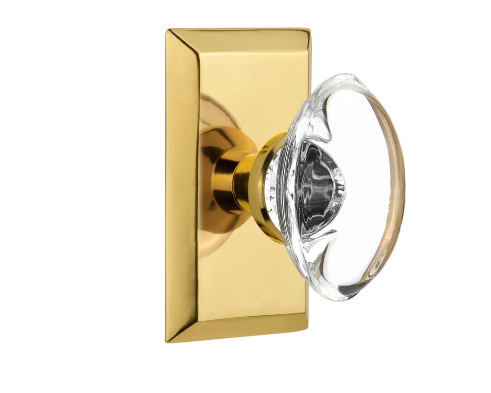 Nostalgic Warehouse Studio Plate with Oval Clear Crystal Glass Knob, Privacy - 2.375", Polished Brass