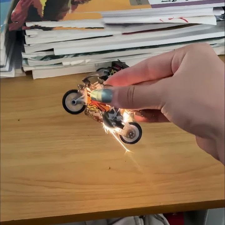 Image of YEPZY Sparkling Stunt Bike Toy Keychain for Kids, Mini Motorcycle Key Ring with Spark Effect & Light, Friction Powered Racing Bike Toy, Gift for Boys & Girls (Random Color)