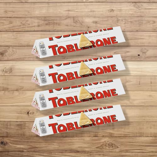 Image of COCOCART Toblerone Chocolate Bar, Enjoy Toblerone, The Iconic Triangular Chocolate from Switzerland (Pack of 4, White), 100 gram