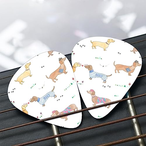 Lot de 12 médiators en forme de teckel avec boîte pour ukulélé, guitare électrique, basse - Les Beatles, Paul McCartney, John Lennon, RIngo Starr, George Harrison Lot de 12 médiators en forme de teckel avec boîte pour ukulélé, guitare électrique, basse – Image 8