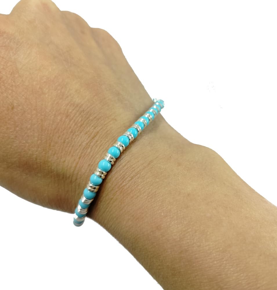 Spadarella bracciale con 2 anellini in argento e pietre naturali turchese tonda da 3 mm.Prodotto artigianale.Made in Italy.Unisex.Lunghezza 19cm.