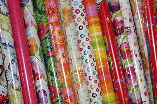 5 rotoli di carta regalo in differenti colori e