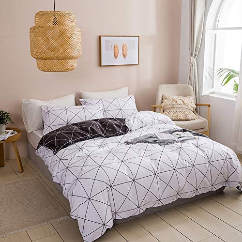 Housse de couette rayée et géométrique noire blanche en textile souple