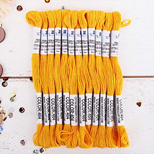 Image of 12 Skeins ThreadArt Cotton Embroidery Floss, Gold | Long fiber cotton embroidery floss for cross stitch, hand embroidery and bracelets. Six-strand floss separates easily.