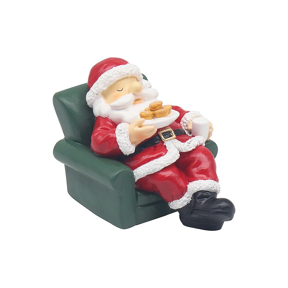 Lesser & Pavey Santa relaxing in a chair with mince pies